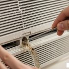 how to clean window ac drain line