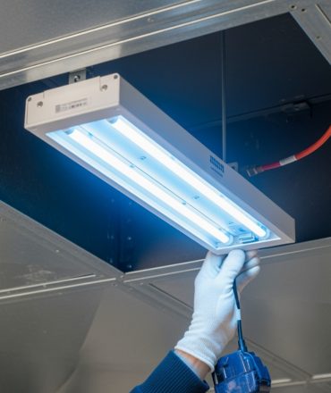 installing-uv-light-in-hvac-image - National Air Duct USA installing uv light in hvac